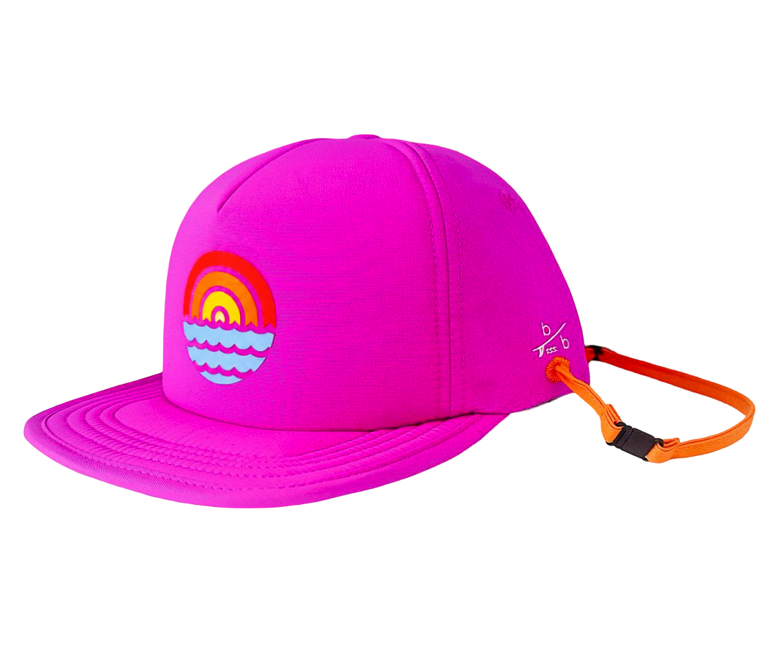Side view of bright pink sun protection kids trucker hat showing secure chin strap