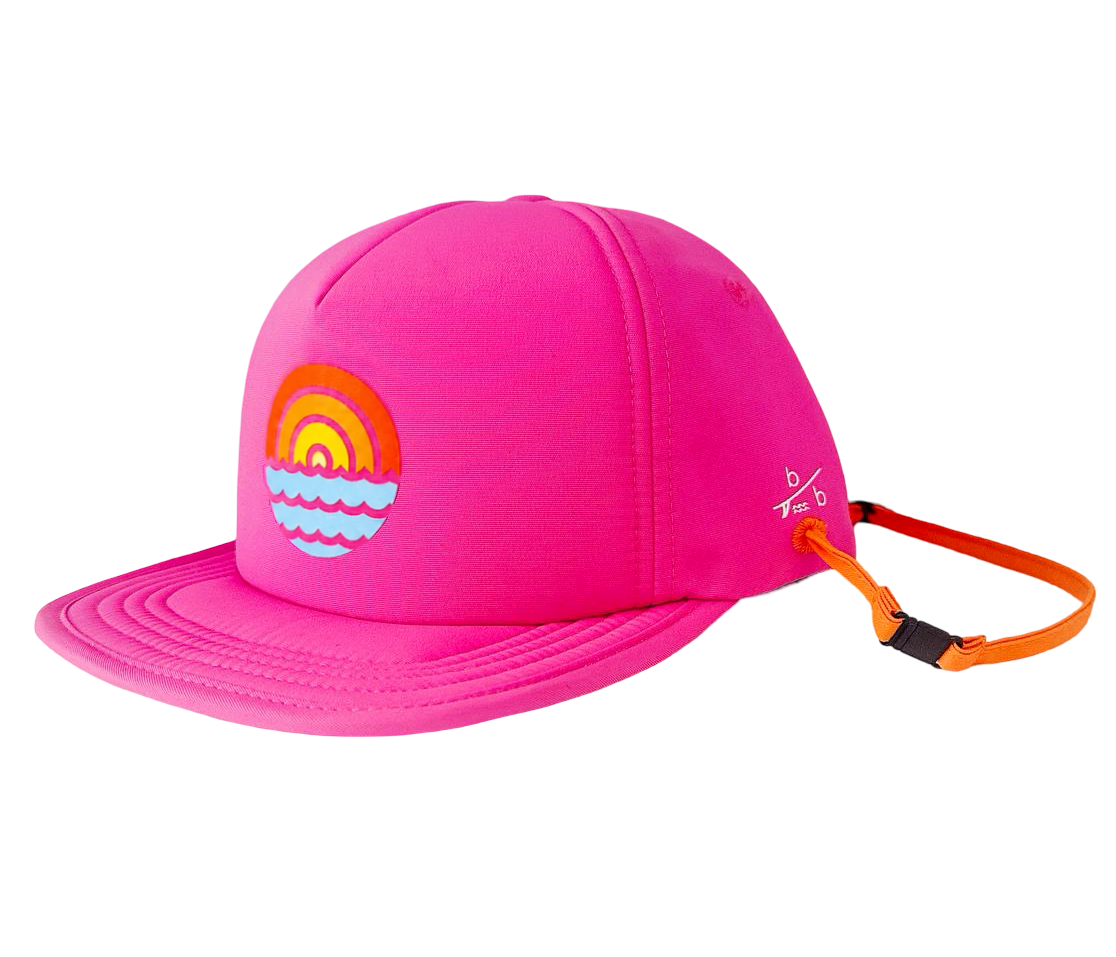 Side view of bright pink sun protection kids trucker hat showing secure chin strap